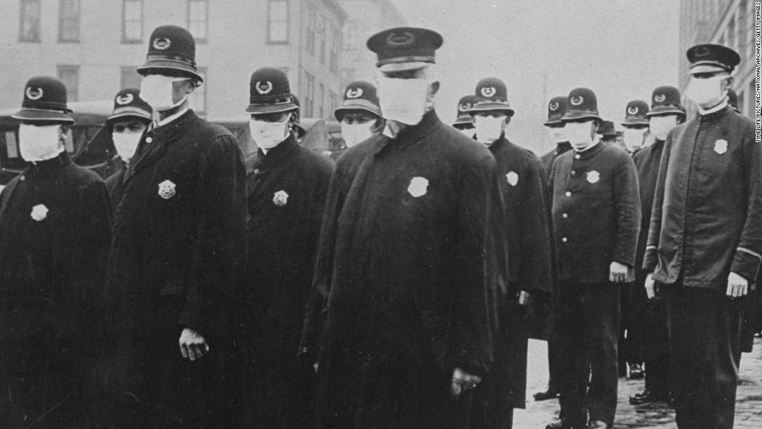 Seattle policemen wearing protective gauze face masks during influenza epidemic of 1918 which claimed millions of lives worldwide (Photo by Time Life Pictures/National Archives/The LIFE Picture Collection via Getty Images)
